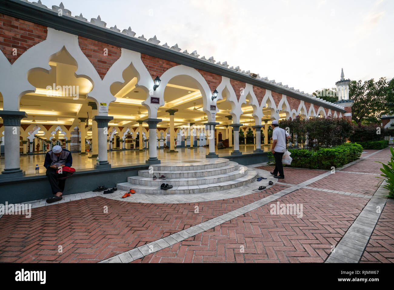 Une vue de la mosquée Jamek Masjid au coucher du soleil à Kuala Lumpur, Malaisie Banque D'Images