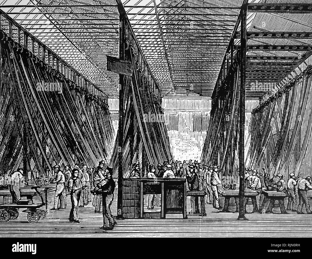 Illustration de machines à entraînement par courroie utilisés pendant la fabrication de fusils à la Royal Small Arms Factory, Enfield, Angleterre. 1880 Banque D'Images