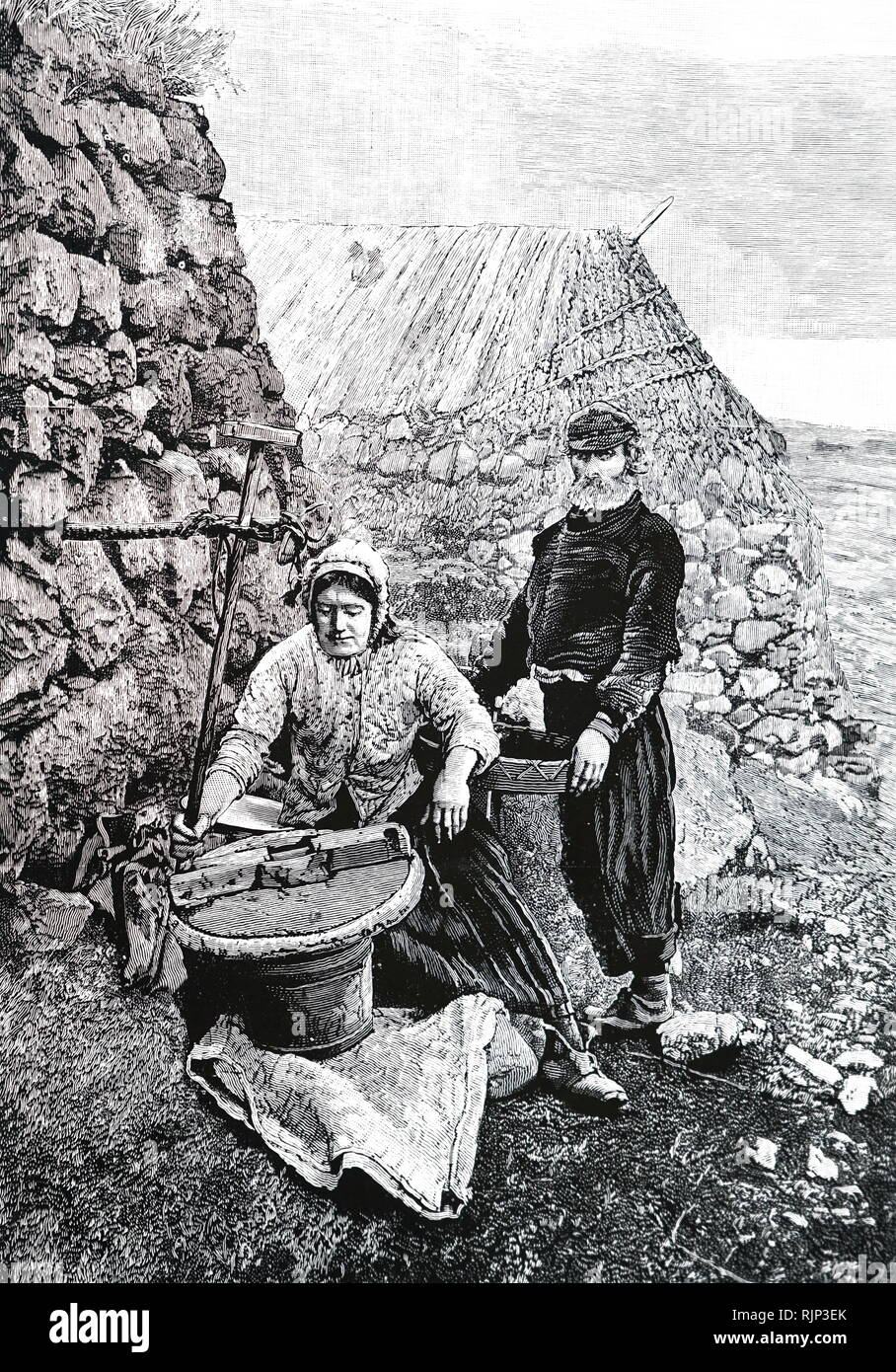 Une gravure représentant des crofters Skye maïs broyage à l'aide d'un moulin à meules ou à la main. En date du 19e siècle Banque D'Images