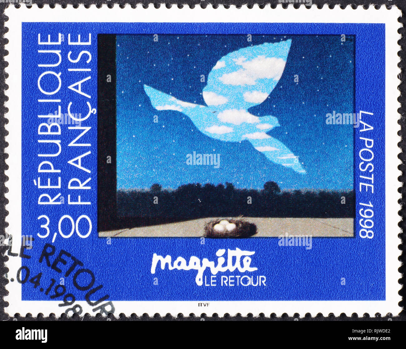 Célèbre tableau de Magritte sur timbre-poste français Banque D'Images