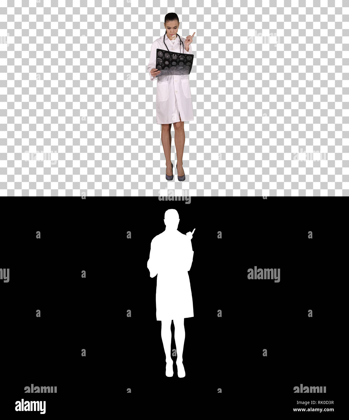 Sur Alpha Matte. Sur toute la longueur. Femme médecin avec labcoat blanc, à la recherche de x-ray image radiographie, tomodensitométrie, IRM, Canal Alpha. Sho professionnel Banque D'Images