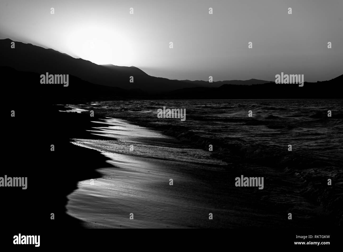 Plage au coucher du soleil Banque D'Images