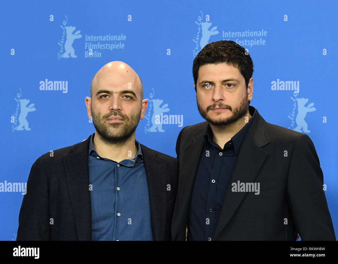 Berlin, Allemagne. 12 Février, 2019. 69e Berlinale - Photocall, 'La Paranza dei Bambini (Piranhas)', l'Italie, la concurrence : Roberto Saviano (l), scénariste, et Claudio Giovannesi, directeur. Credit : Ralf Hirschberger/dpa/Alamy Live News Banque D'Images