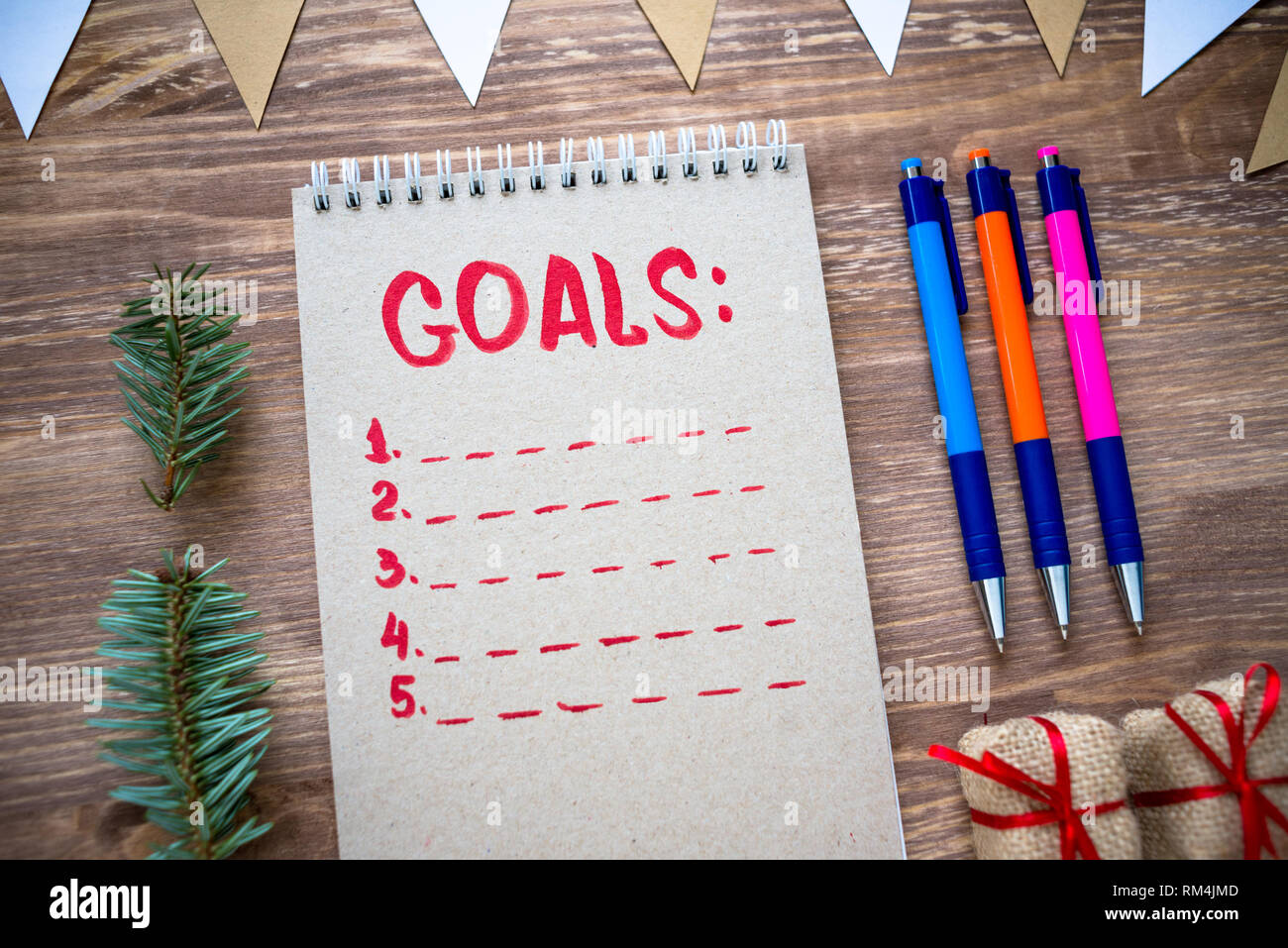 Vue de dessus du bloc-notes avec liste des objectifs du concept de plan, Banque D'Images