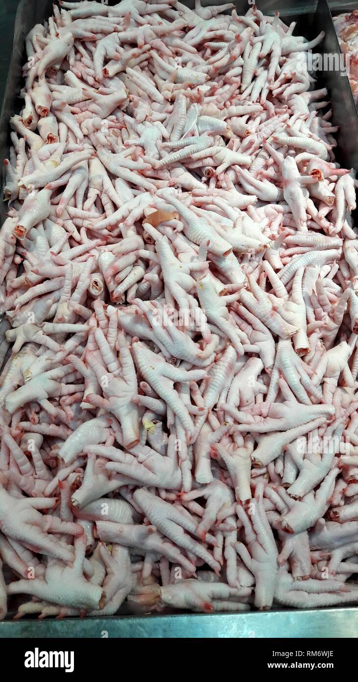 Pieds de poulet photo dans marché thaïlandais Banque D'Images
