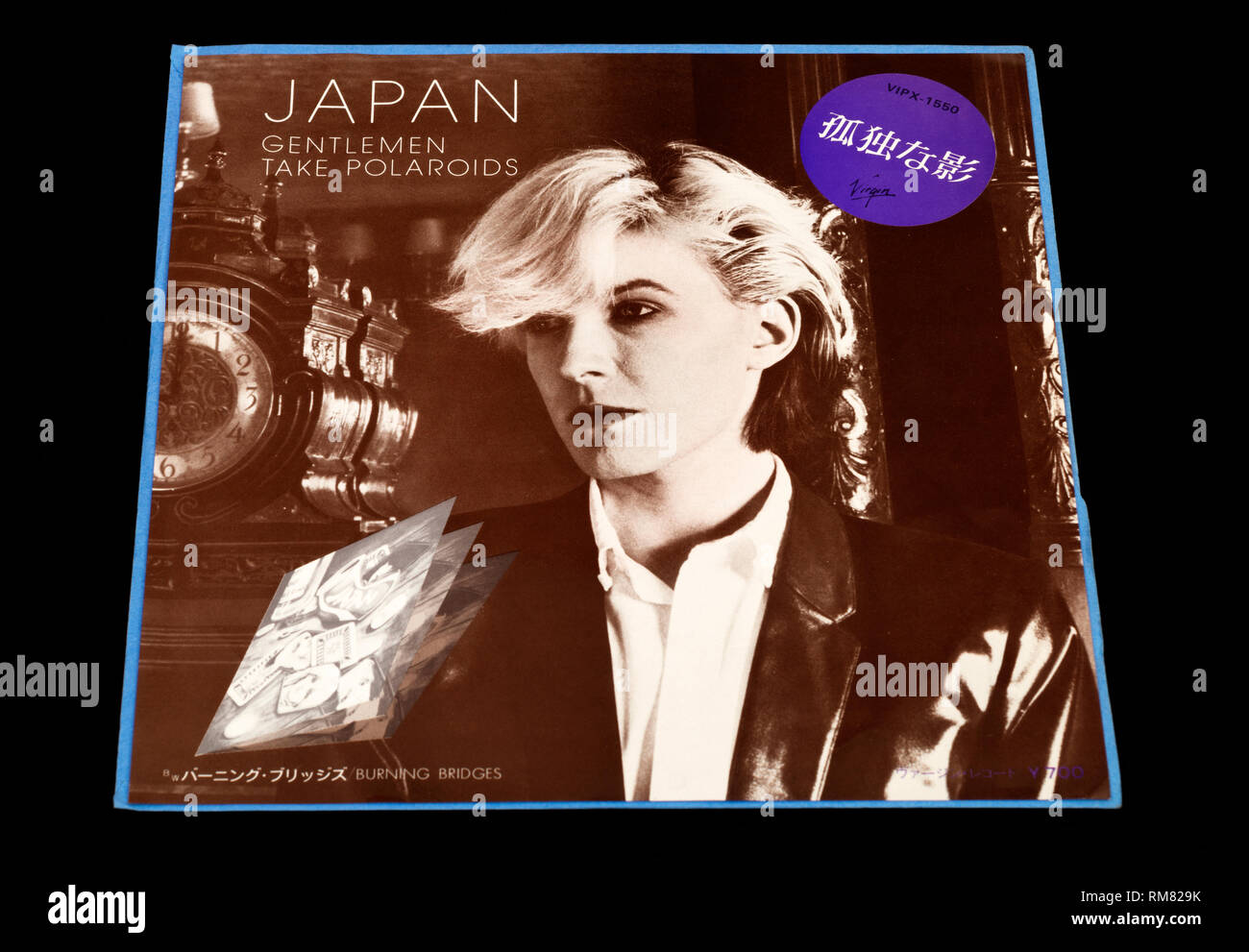 Le Japon Messieurs Prendre des polaroïds 7 pouce seul enregistrement Banque D'Images