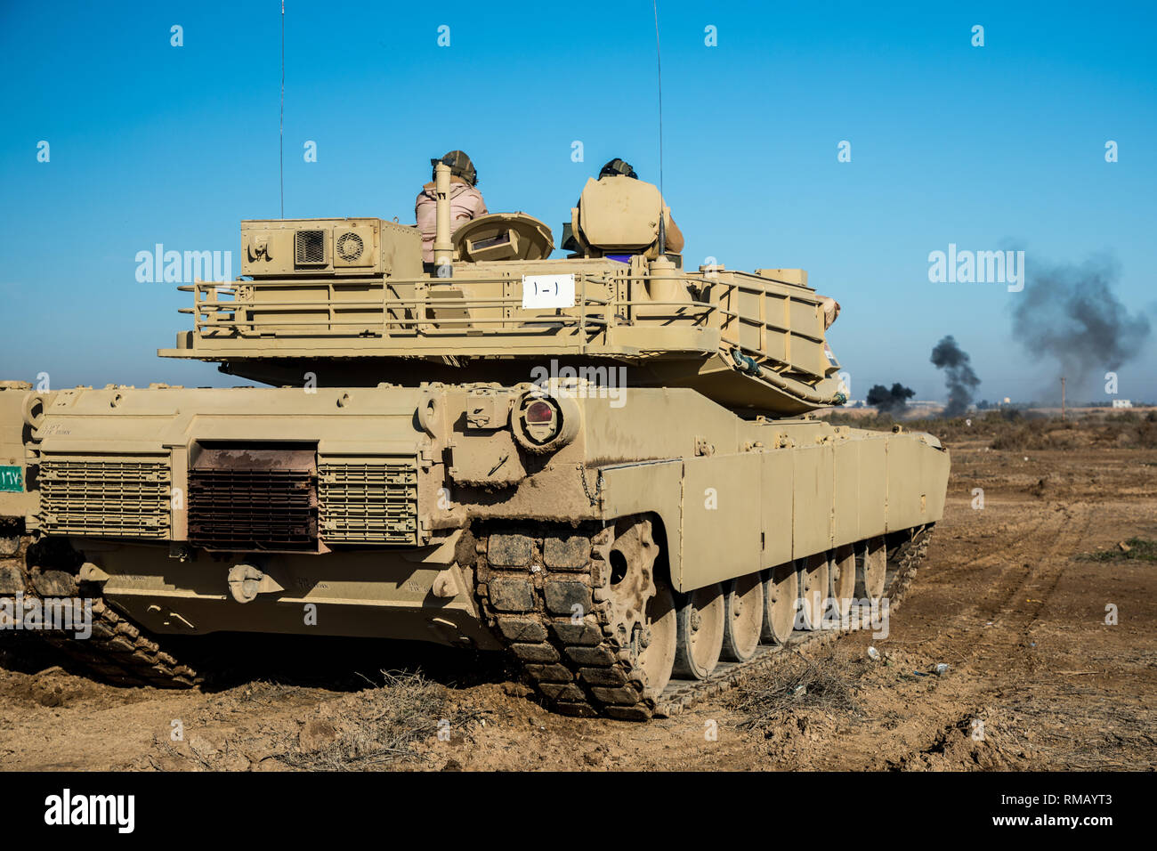 Un Irakien M1A1 Abrams tank avec l'armée iraquienne (IA) 9e Division blindée participe à une école de lutte contre Bagdad (BFS)-led activité culminante au Complexe militaire de Taji, l'Iraq, le 20 janvier 2019. L'activité synthèse est l'épreuve ultime pour quatre bataillons d'IA qui ont reçu 10 semaines de formation à partir de la BFS sous la supervision d'un instructeur de l'armée australienne de l'équipe d'évaluateurs de Taji Groupe 8. La formation permet à l'IA pour poursuivre les opérations contre la menace de l'extrémisme violent et à prévenir la résurgence d'ISIS et de son idéologie extrémiste violent. (U.S. Photo de l'armée par la CPS. Javion Siders) Banque D'Images