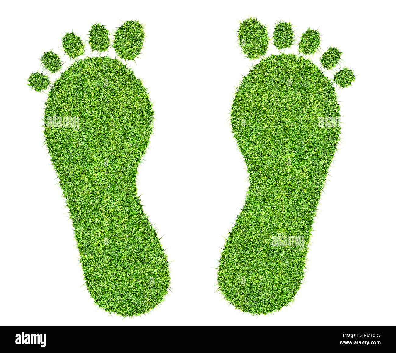 Foot print made of green grass isolated Banque D'Images