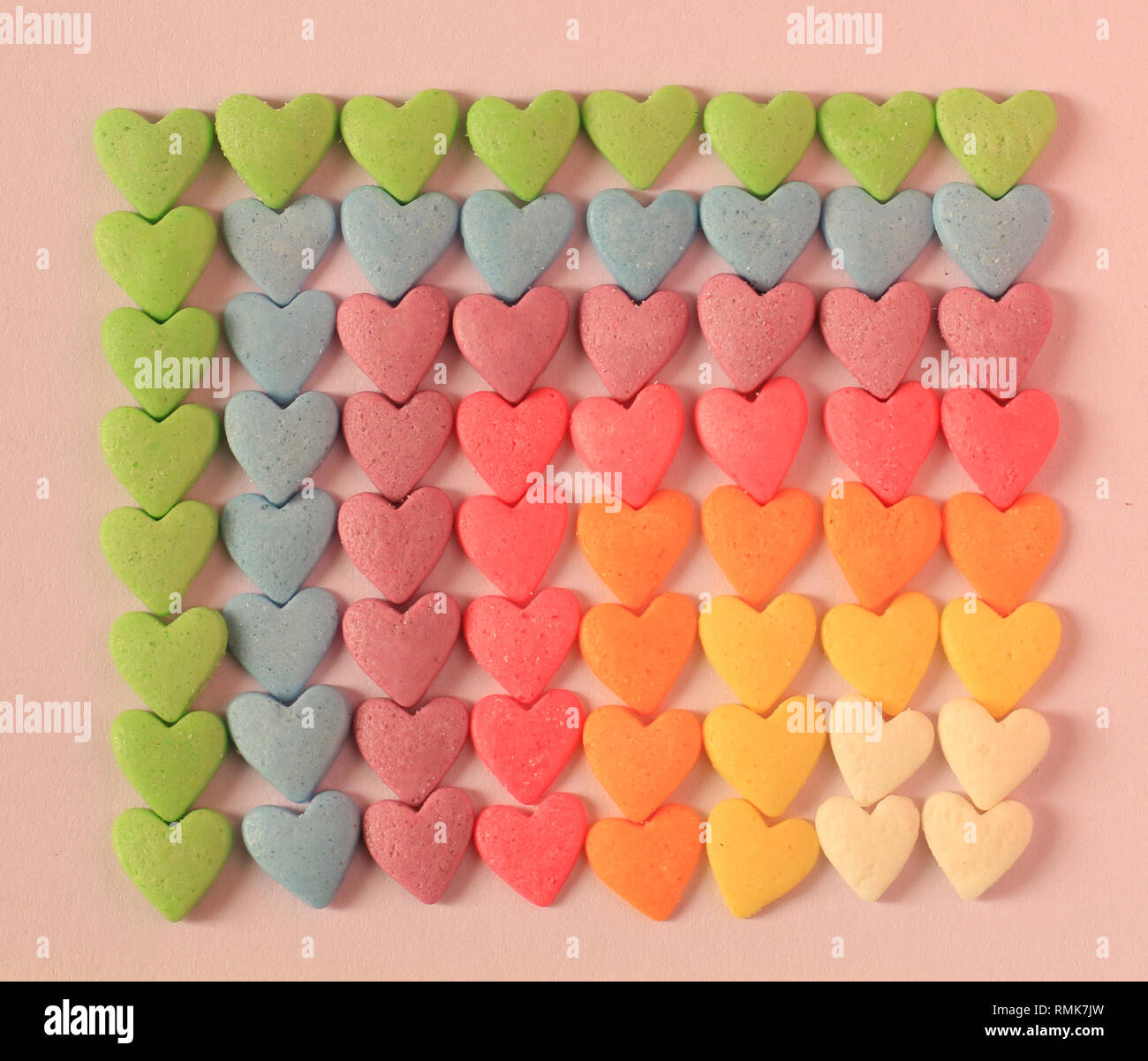 Fond de bonbons coloré en forme de coeur Banque D'Images