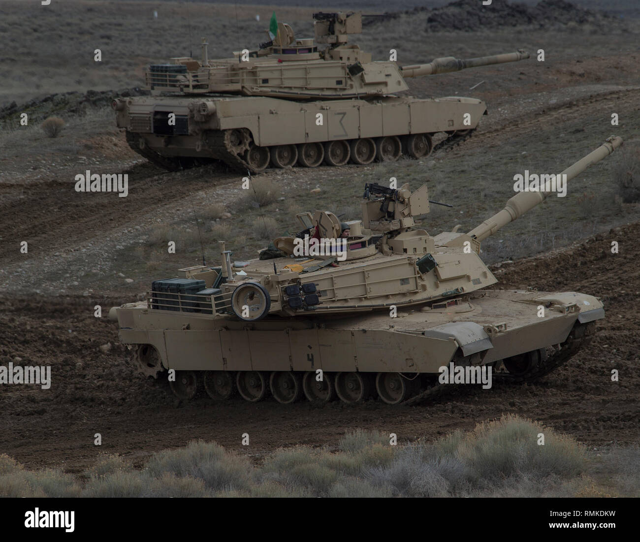 M1A2 Abrams Tanks provenant d'une société, 2-116ème Cavalry Brigade Combat Team (CBCT), New Jersey Army National Guard courir à travers des exercices sur Orchard Centre d'instruction au combat (CTEO). Banque D'Images