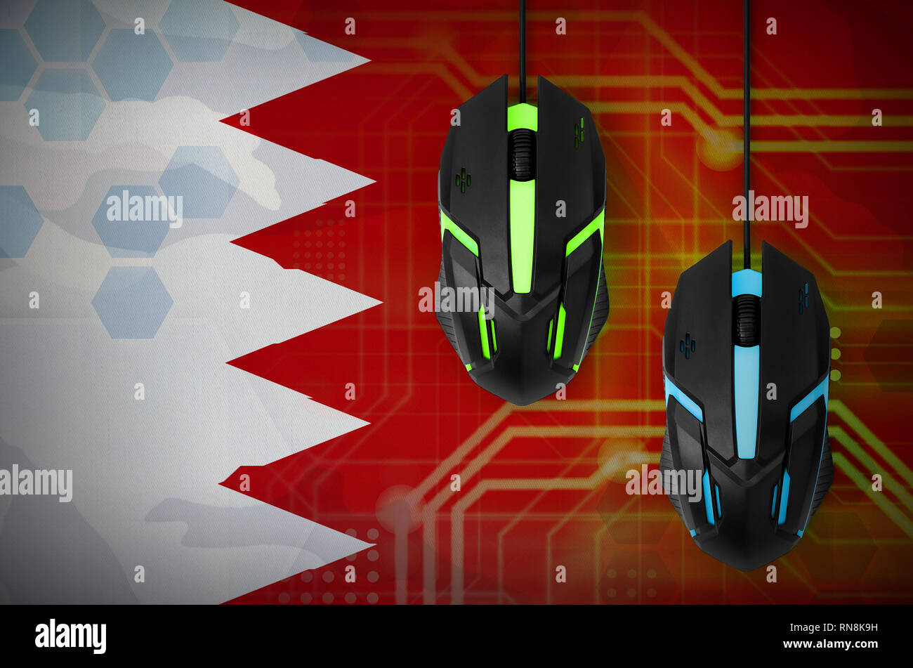 Bahreïn un drapeau et deux souris ordinateur moderne avec rétro-éclairage. Le concept de jeux coopératifs en ligne. L'équipe de Cyber sport Banque D'Images