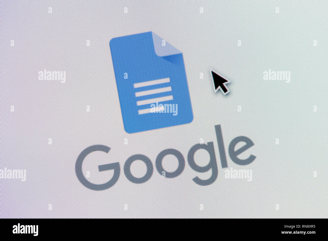 Le logo de Google Docs est vu sur l'écran d'un ordinateur avec une souris (curseur utilisation éditoriale uniquement) Banque D'Images