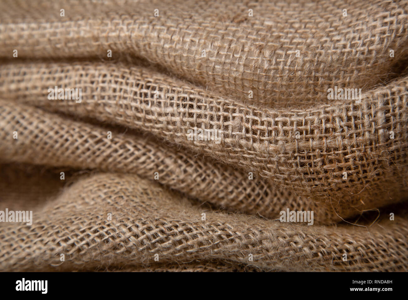 La toile de jute ou de jute tissée ouvert texture background. Shallow DOF Banque D'Images