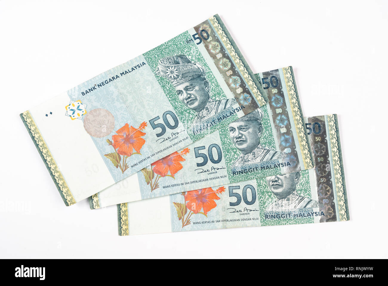 Trois billets de 50 Ringgit malaisien sur une surface blanche Banque D'Images