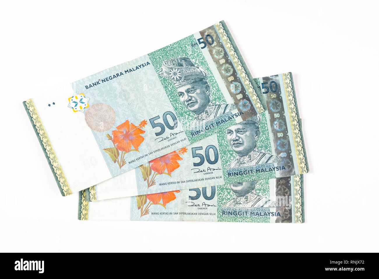 Trois billets de 50 Ringgit malaisien sur une surface blanche Banque D'Images