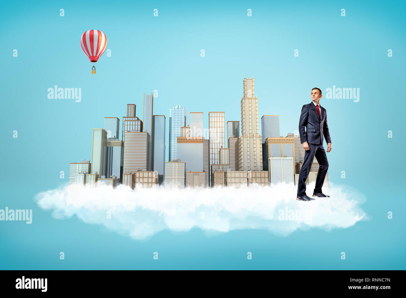 Businessman with city skyscrapers sur nuage blanc et ballon à air chaud dans l'air sur fond bleu. Les personnes et les objets de l'art conceptuel. Bâtiment et stru Banque D'Images