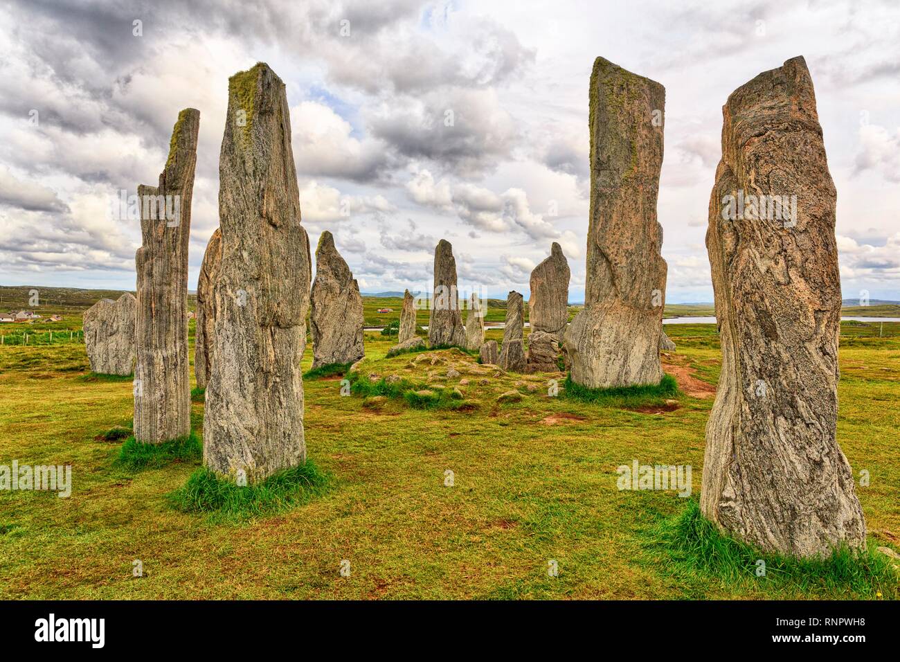 La Formation de Pierre mégalithe Callanish Standing Stones, Stone Circle sous un ciel nuageux, l'île de Lewis et Harris, Outer Hebrides Banque D'Images