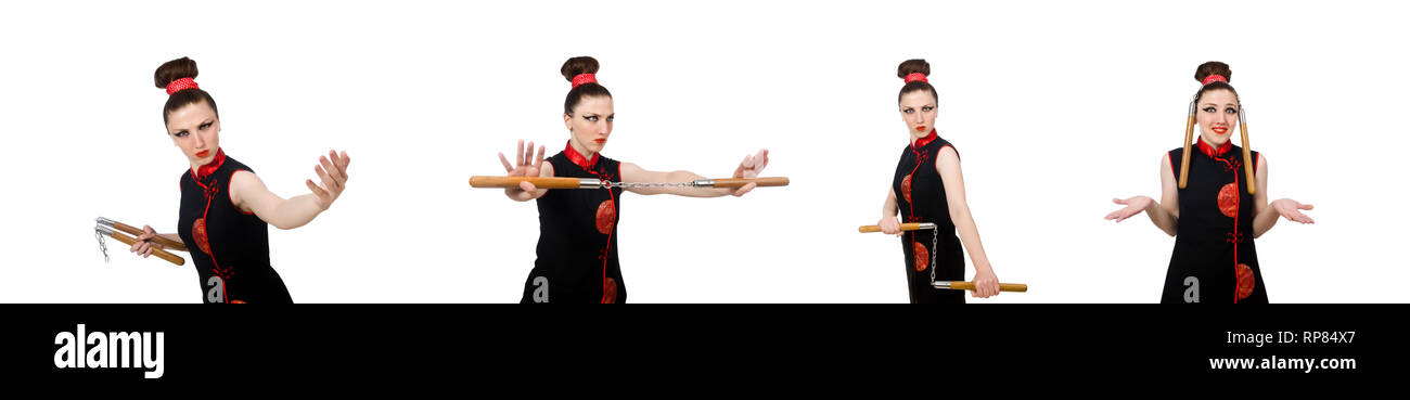 Femme drôle avec nunchucks isolated on white Banque D'Images