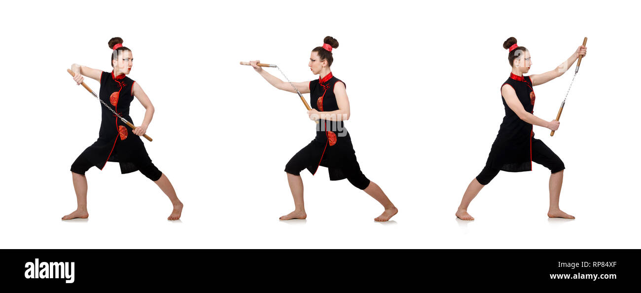 Femme drôle avec nunchucks isolated on white Banque D'Images