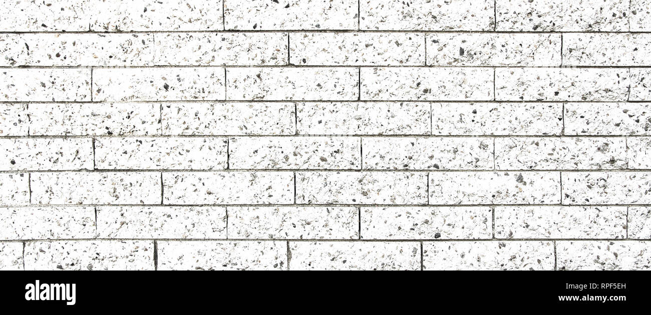 Blanc et gris simple mur en brique en pierre rectangulaire modèle surface texture transparente en arrière-plan large panorama banner format. Banque D'Images