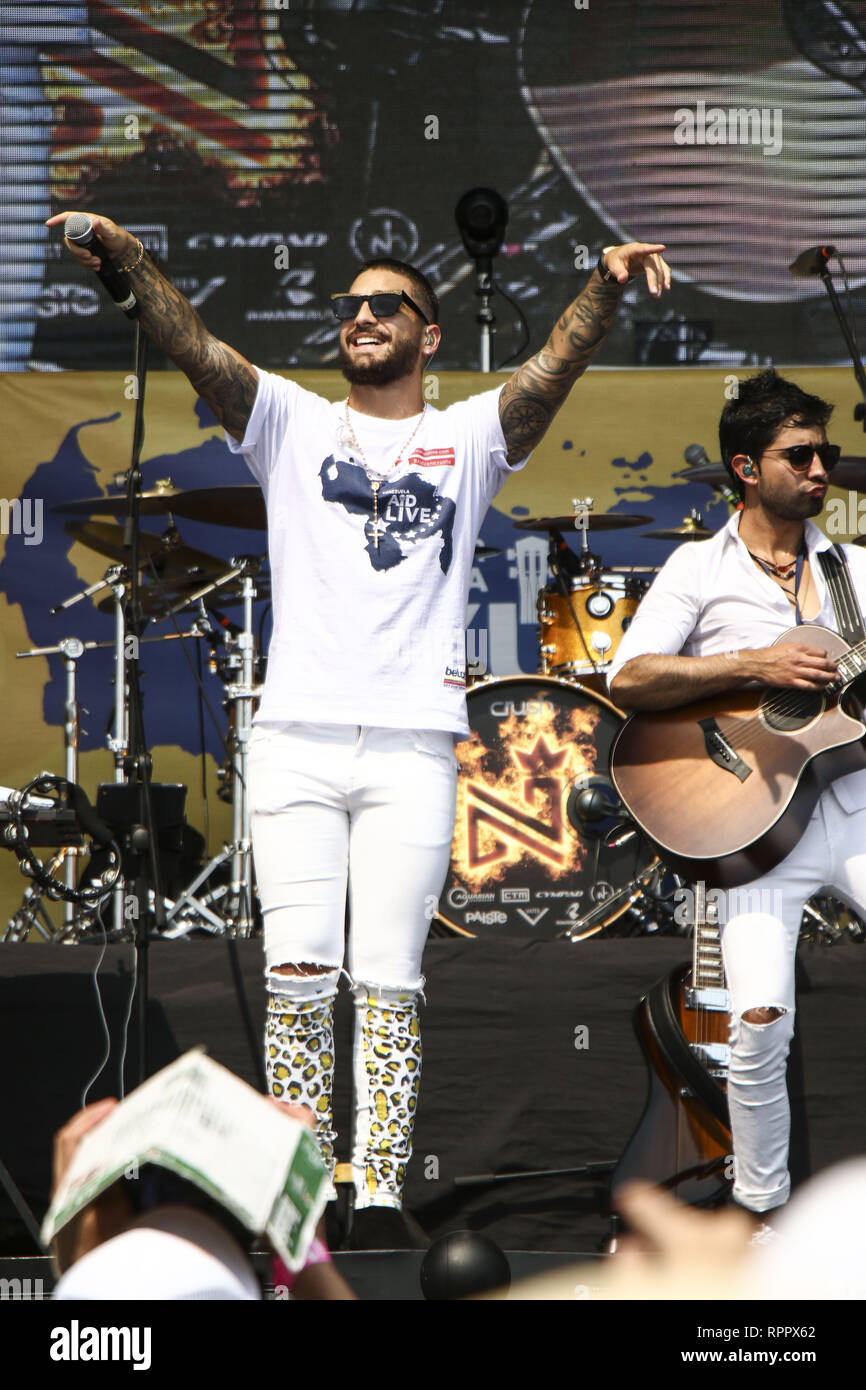 Caracas, Venezuela. Feb 22, 2019. Maluma, au cours de la ''Venezuela vit de l'aide'' concert, organisé pour recueillir des fonds pour les efforts de secours vénézuélienne à la tête de l'Tienditas pont International à Bogotá, Colombie, le 22 février 2019. Le Venezuela's politique acharnée se métamorphose en une bataille des groupes le vendredi, avec le gouvernement et l'opposition duels concerts pop avant d'un week-end sur l'épreuve d'entrée de l'aide alimentaire et médicale. Credit : Elyxandro Cegarra/ZUMA/Alamy Fil Live News Banque D'Images