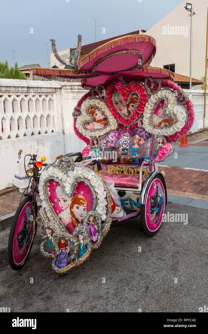 Un Trishaw, populaire parmi les touristes comme une alternative à la marche à pied. Melaka, Malaisie. Banque D'Images
