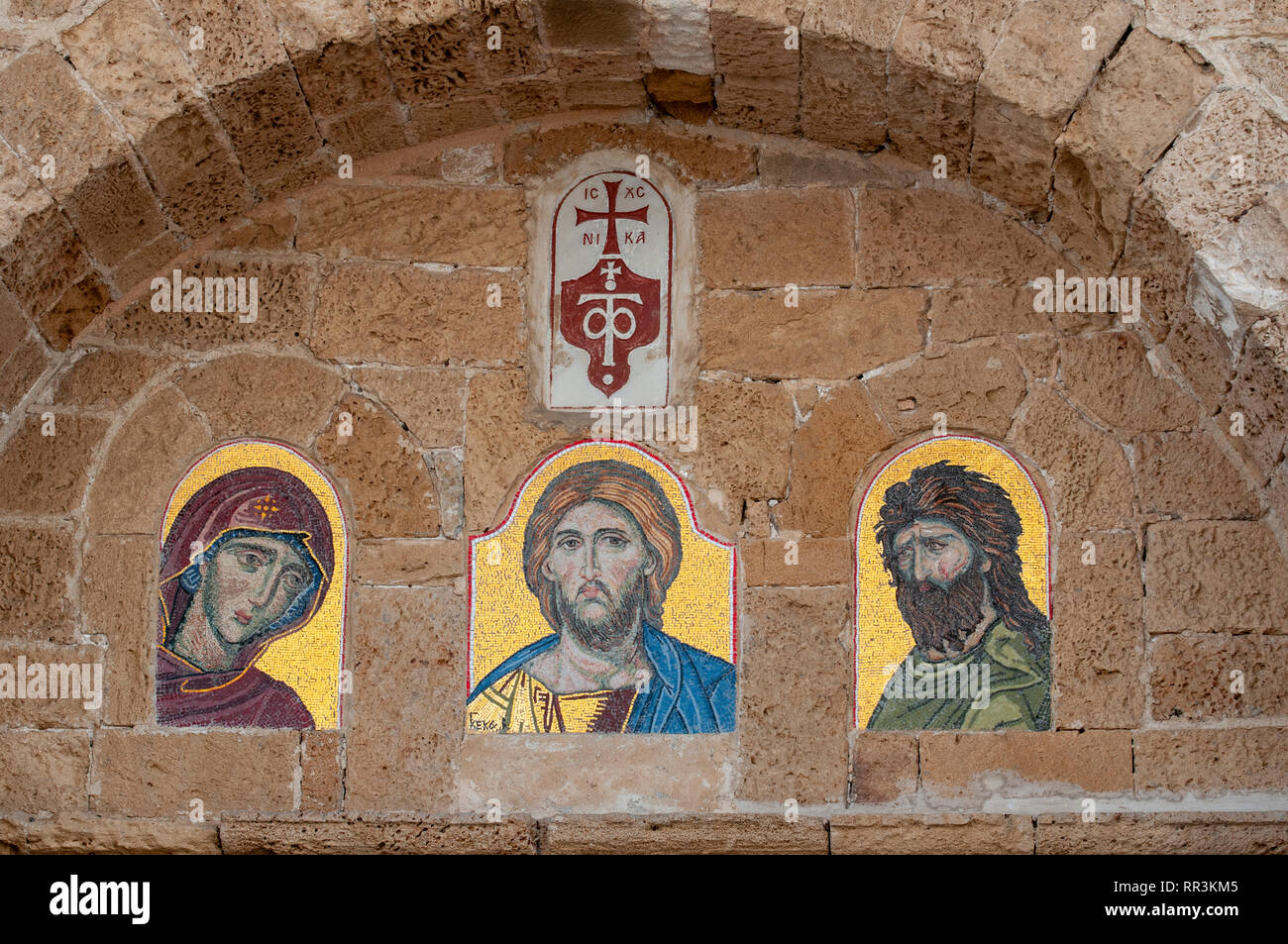 L'ancien port de Jaffa, Israël photos de saints dans le monastère grec-orthodoxe wall Banque D'Images