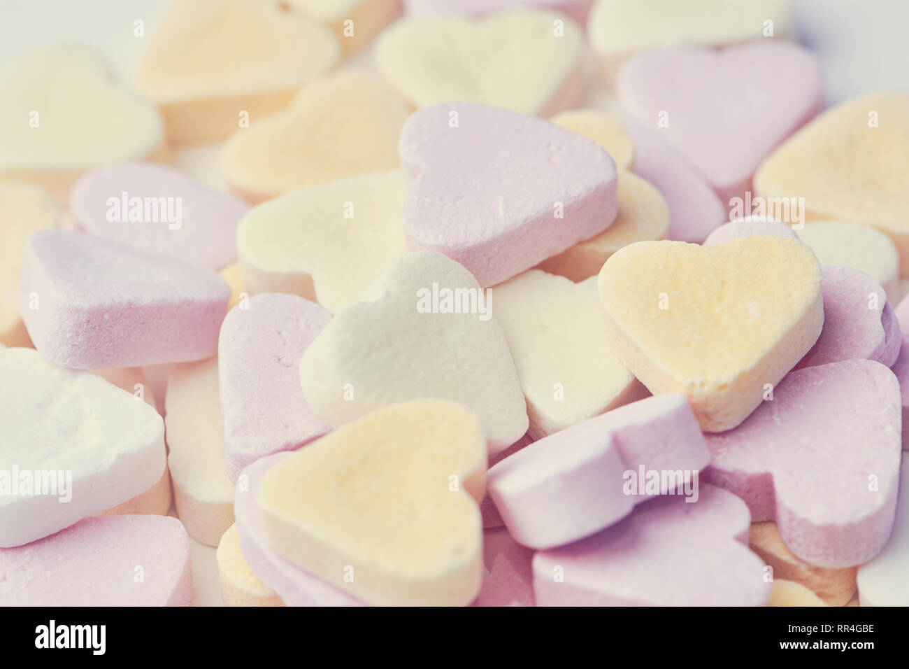 Bonbons coeur de macro, mat style couleur photo comme arrière-plan arrière-plan Banque D'Images