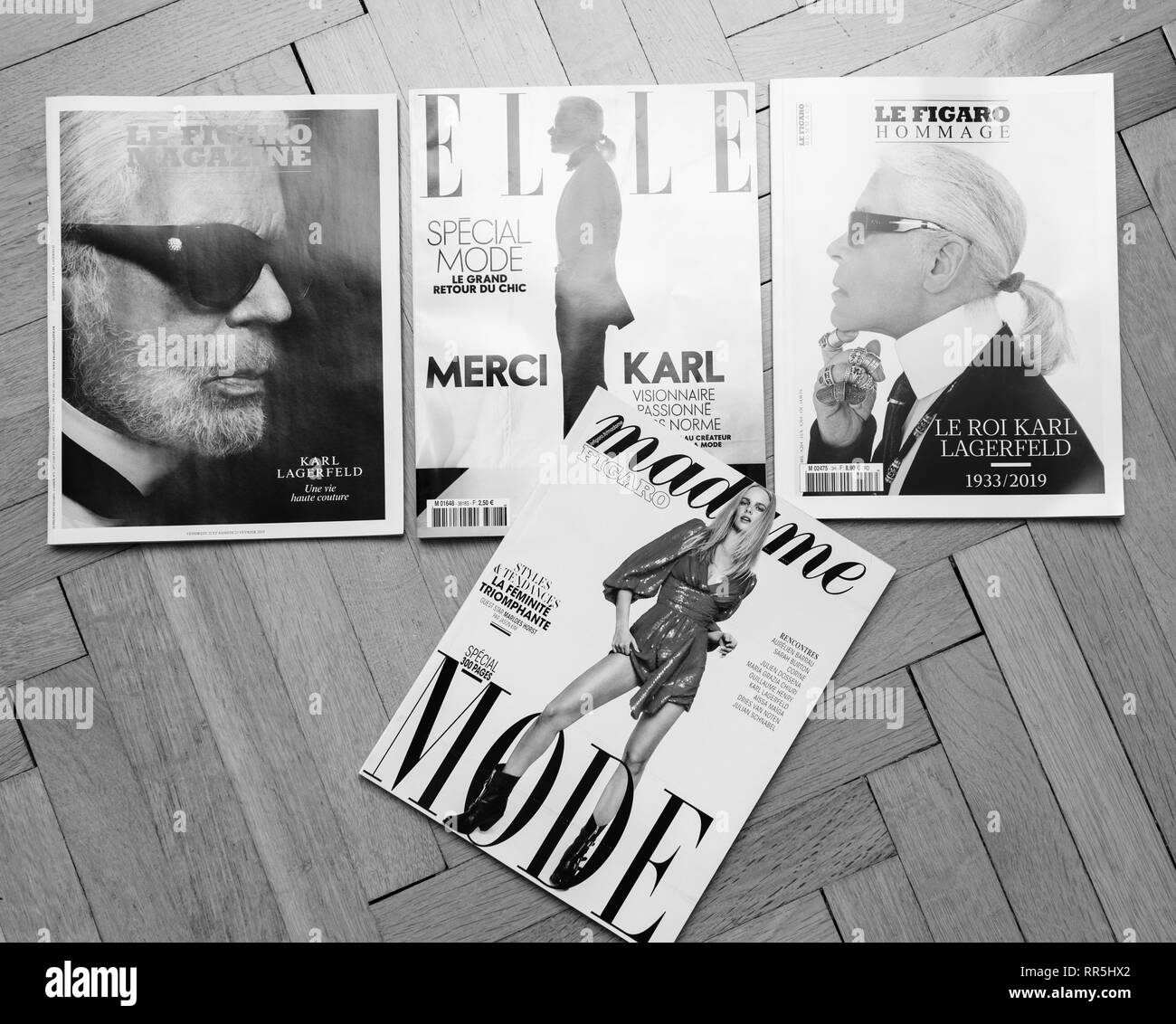 Paris, France - Dec 23, 2019 : Plusieurs magazines français hommage organisé sur le parquet, couvrant la mort Karl Lagerfeld, créateur de mode iconique est mort de 85 ans Banque D'Images