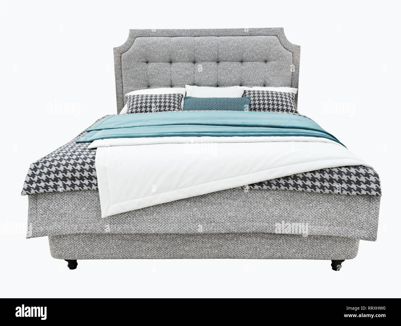 Lit de luxe moderne avec des meubles gris sellerie tissu texture capitone tête de lit et draps. Des meubles classiques et modernes avec des chiffon bande Banque D'Images