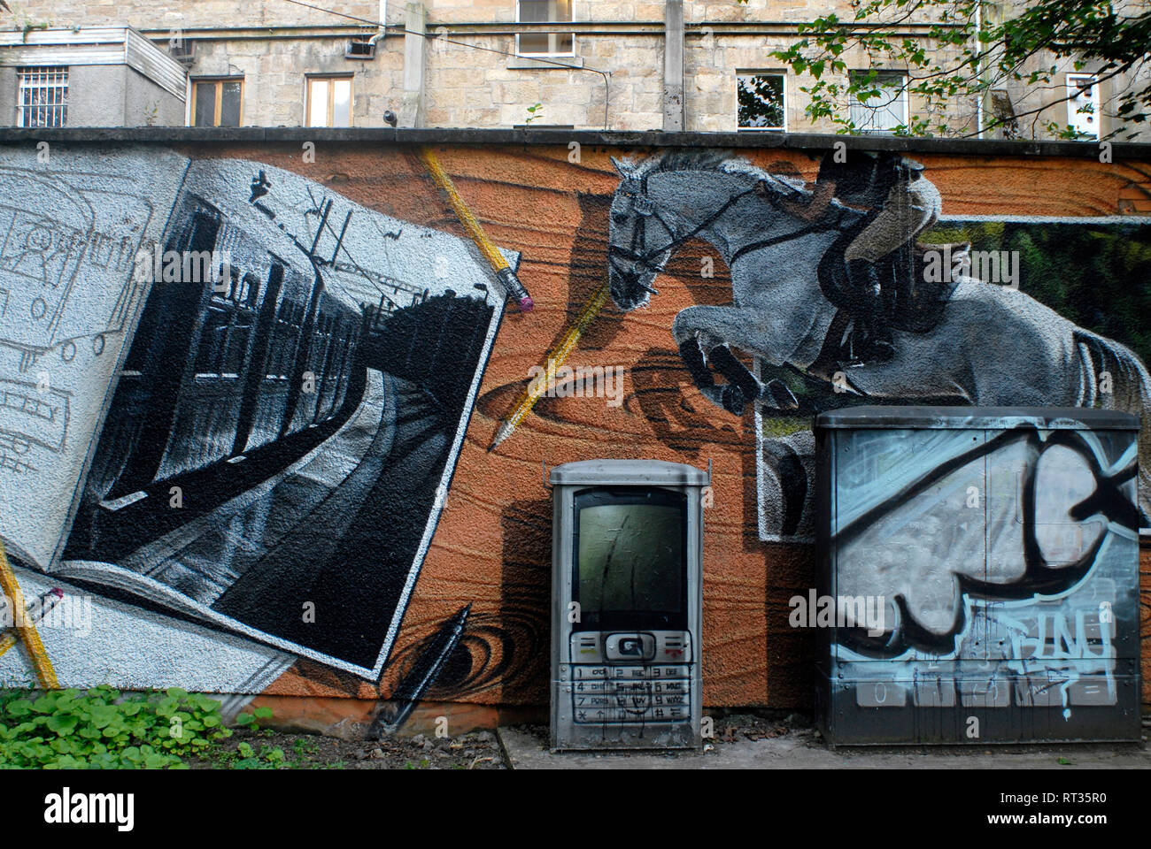 Graffiti tourisme: Peinture réaliste sur le mur du pont au-dessus de la rivière Kelvin, Glasgow, Ecosse, Royaume-Uni Banque D'Images