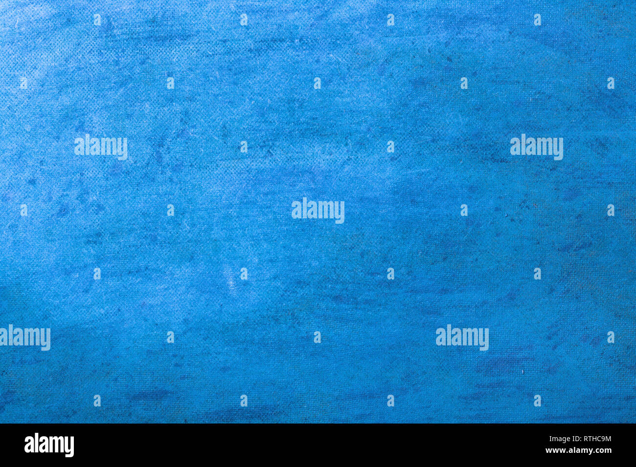 L'arrière-plan. La surface de la texture rugueuse avec carton comprimé est peint avec de la peinture bleue. Banque D'Images