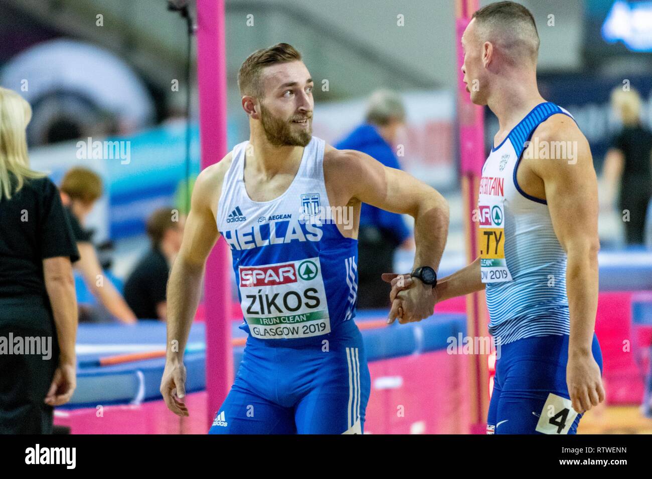 Glasgow, Ecosse, Royaume-Uni. 2 mars, 2019. Richard KILTY GBR, ZÍKOS Konstadínos GRE concurrentes dans les 60m Hommes événement secion durant la deuxième journée de l'Europe d'athlétisme en salle 2019 à Emirates Arena de Glasgow, Ecosse, Royaume-Uni. Crédit : 2.03.2019 Cronos/Alamy Live News Banque D'Images