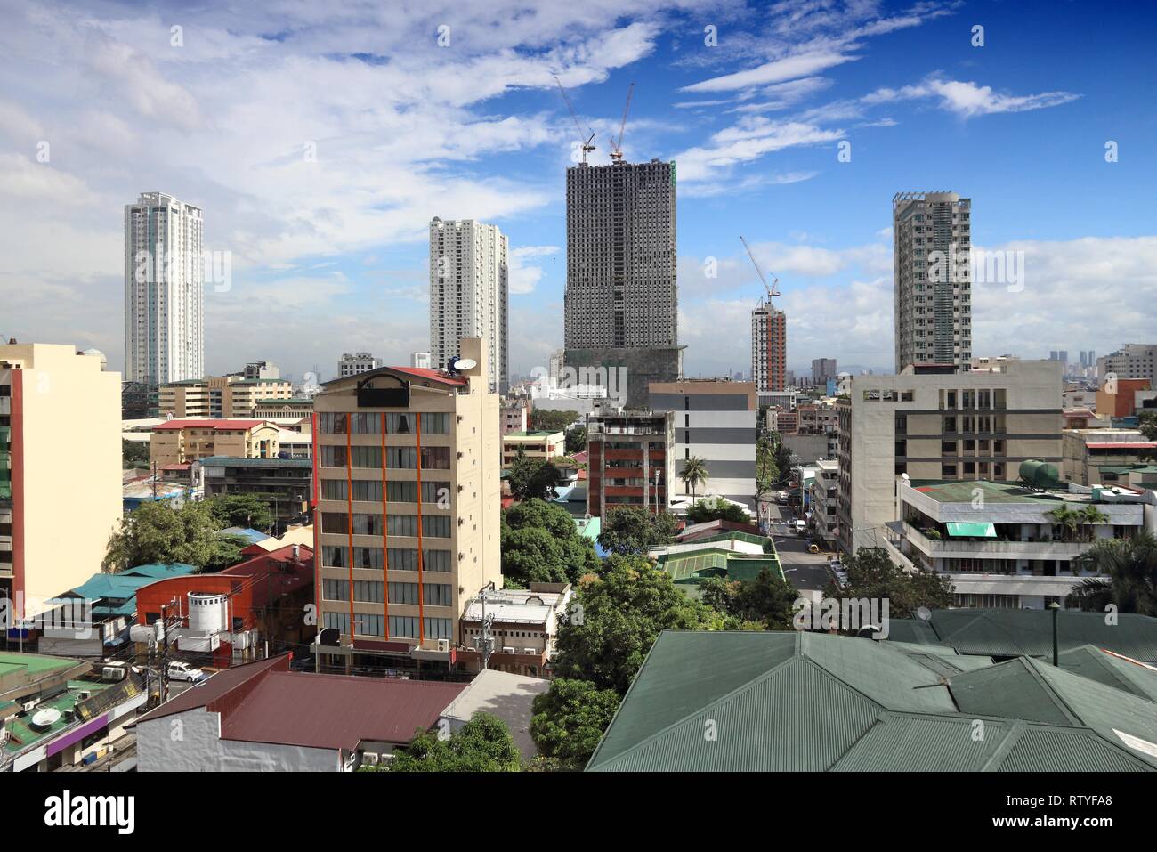 La ville de Manille, Philippines. Skyline avec quartier Malate. Banque D'Images