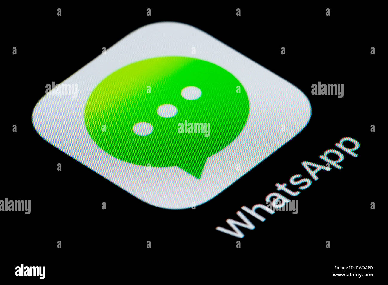 Un gros plan de l'icône de l'application WhatsApp, comme on le voit sur l'écran d'un téléphone intelligent (usage éditorial uniquement) Banque D'Images
