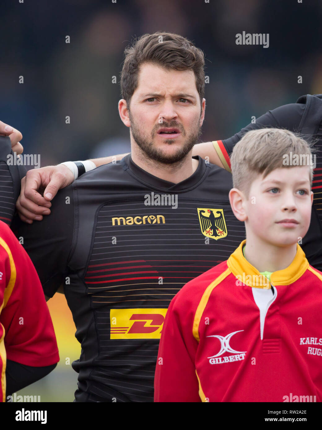 Heidelberg, Allemagne. 09Th Mar, 2019. Troisième match du championnat d'Europe de Rugby 2019 : Germany-Russia sur 09.02.2019 à Heidelberg. Morne Laubscher (Allemagne, 21) pendant l'hymne national. Credit : Jürgen Kessler/dpa/Alamy Live News Banque D'Images