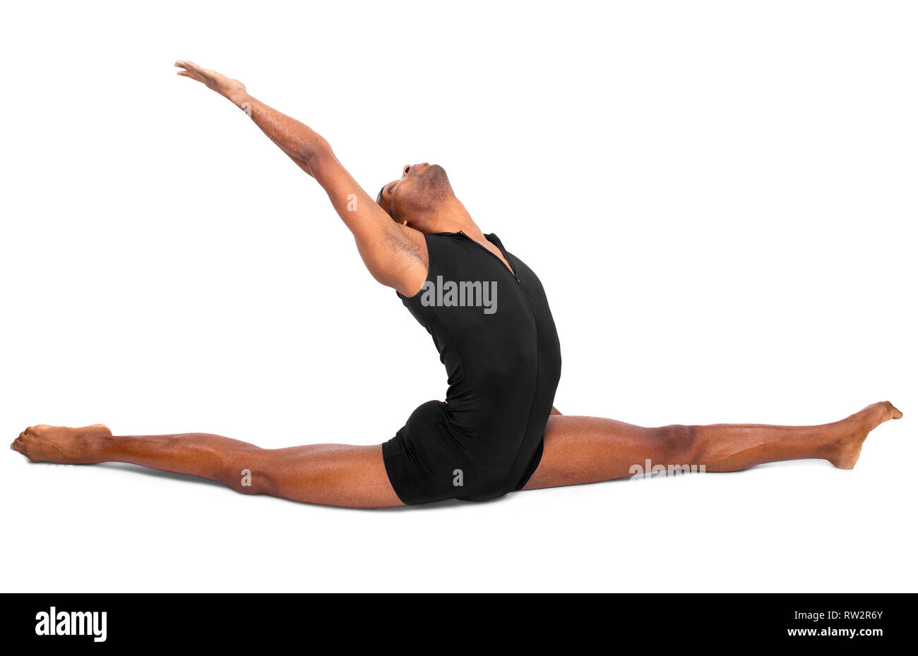 Male ballet dancer le réchauffage et faire preuve de souplesse à fond blanc Banque D'Images