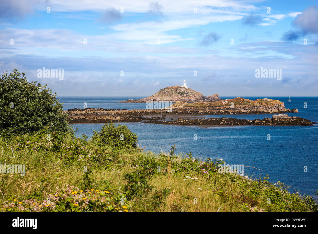 L'Île ronde et le phare de Point de chèvre, Saint Martin's, Îles Scilly, UK Banque D'Images