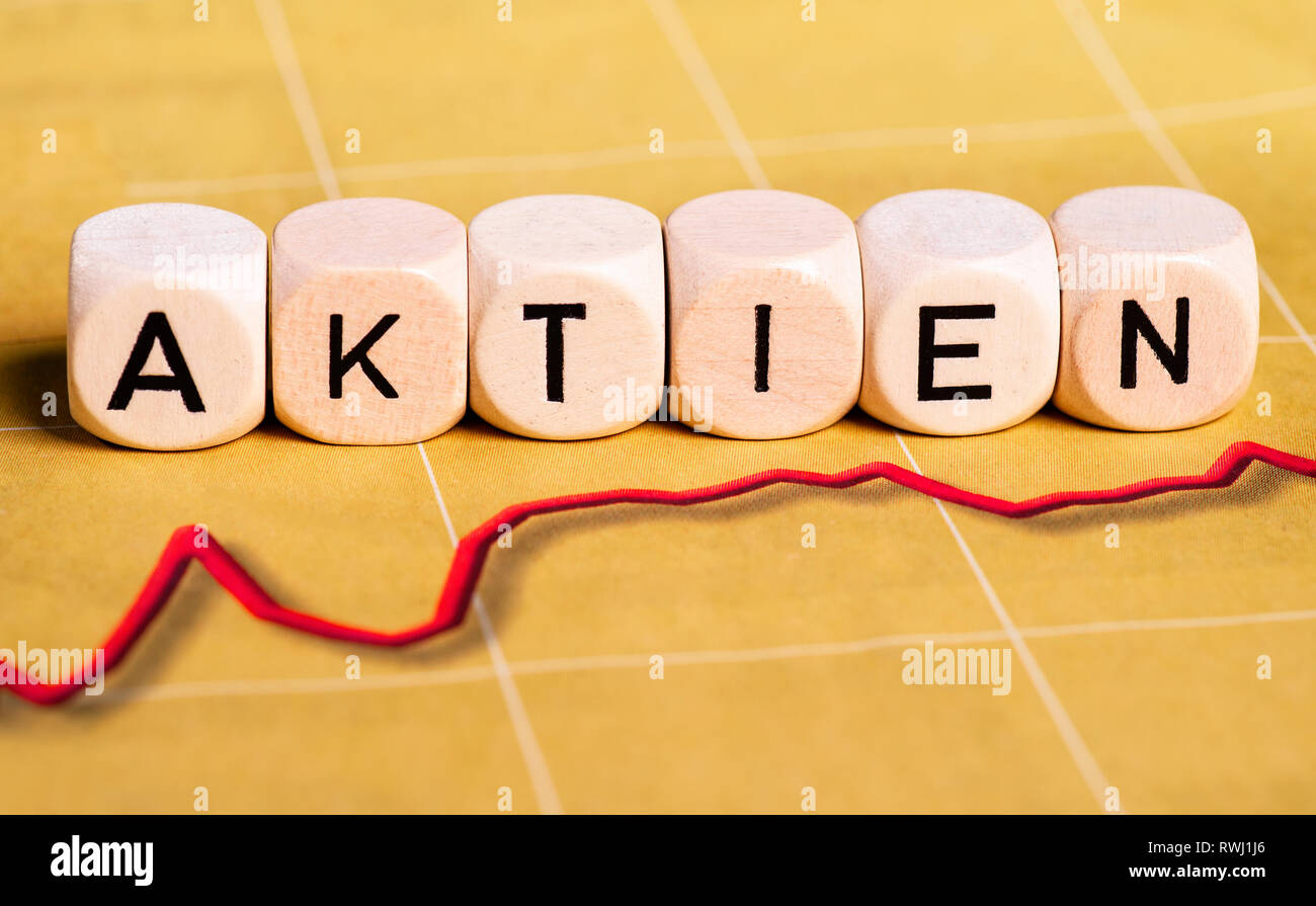 La courbe rouge avec lettres montrant le mot allemand 'Aktien' pour des actions. Banque D'Images