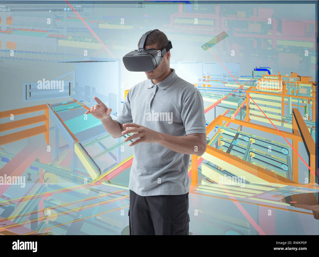 Image composite de l'ingénieur à l'aide de casque de réalité virtuelle dans une VR Banque D'Images