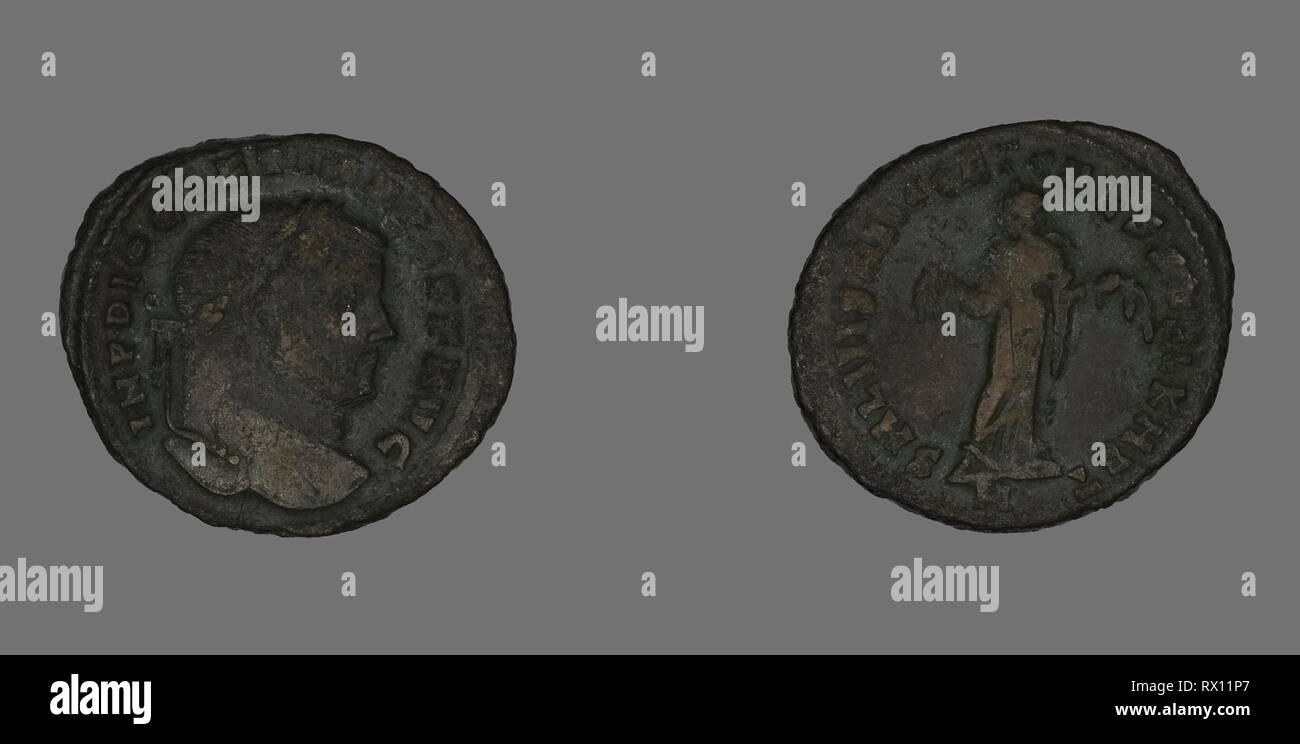 Follis (Coin) représentant un empereur romain. Roman, frappé à Carthage. Date : 298 AD AD-299. Dimensions : diam. 2,9 cm ; 9,10 g. Le bronze. Origine : Empire romain. Musée : le Chicago Art Institute. Auteur : romain antique. Banque D'Images