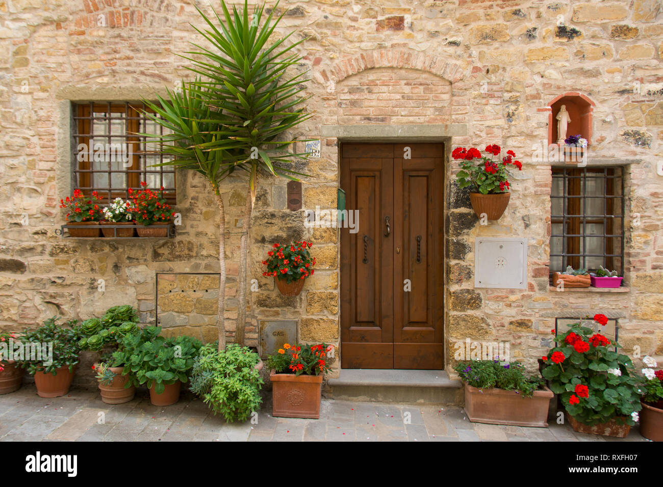 Porte dans la vieille ville fortifiée de San Donato, Tavarnelle Val di Pesa, Toscane, Italie Banque D'Images