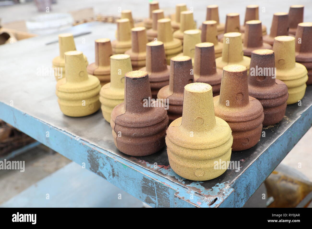 Sable enrobé de résine de coulée pour produits Banque D'Images