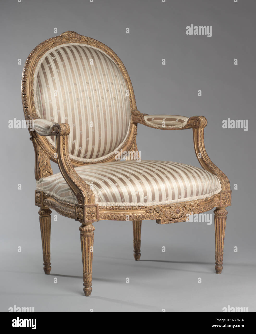 Fauteuil (fauteuil), ch. 1765. Jean-Baptiste II Tilliard (Français, 1797). En bois sculpté et doré ; total : 101,9 x 73,7 x 63,5 cm (40 1/8 x 29 x 25 en Banque D'Images