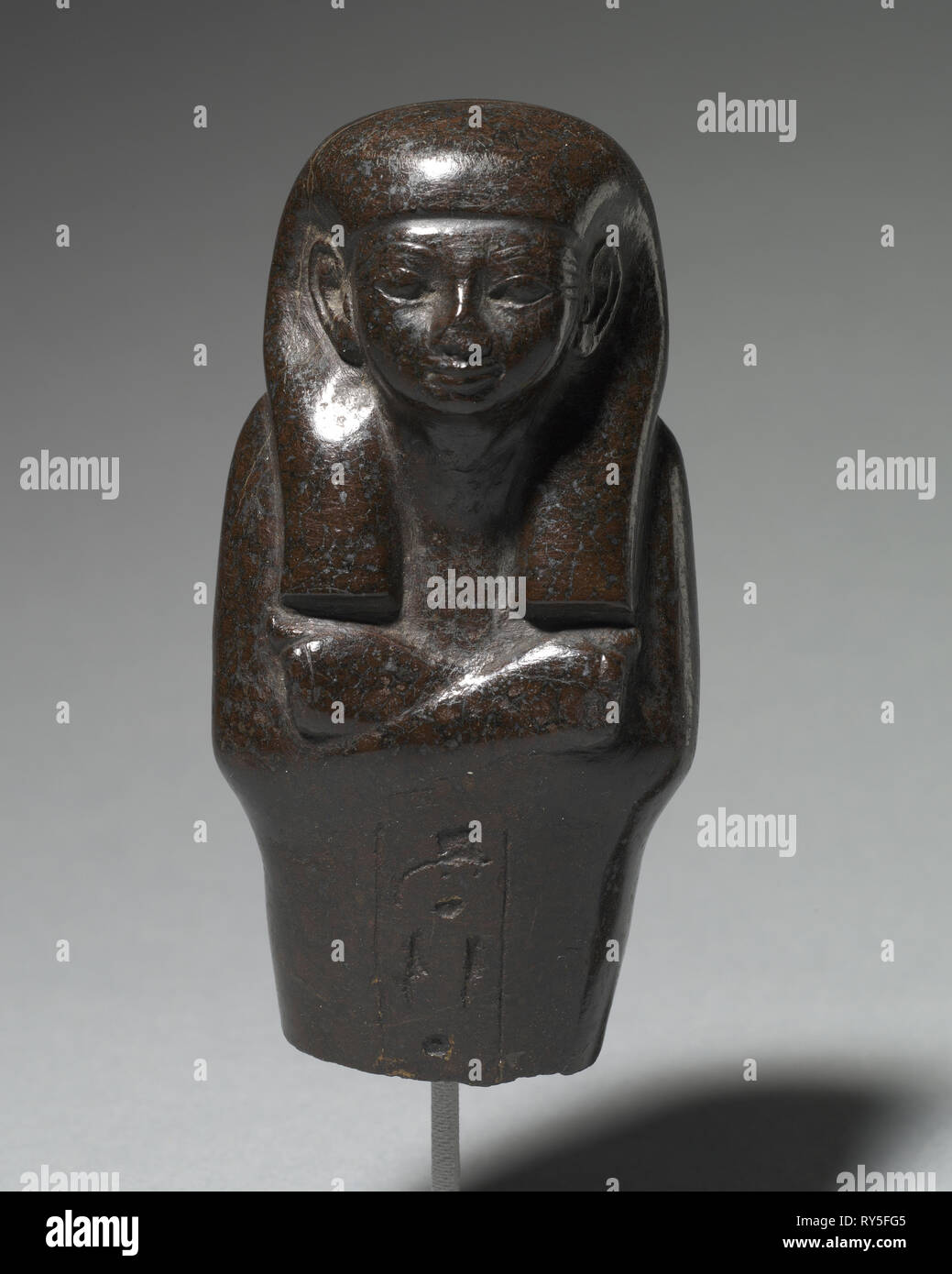 Shawabty, ch. 1859-1648 BC. L'Égypte, l'Empire du milieu, fin 12 et 13 de la dynastie. L'hématite ; total : 10,2 x 5 cm (4 x 1 15/16 in Banque D'Images
