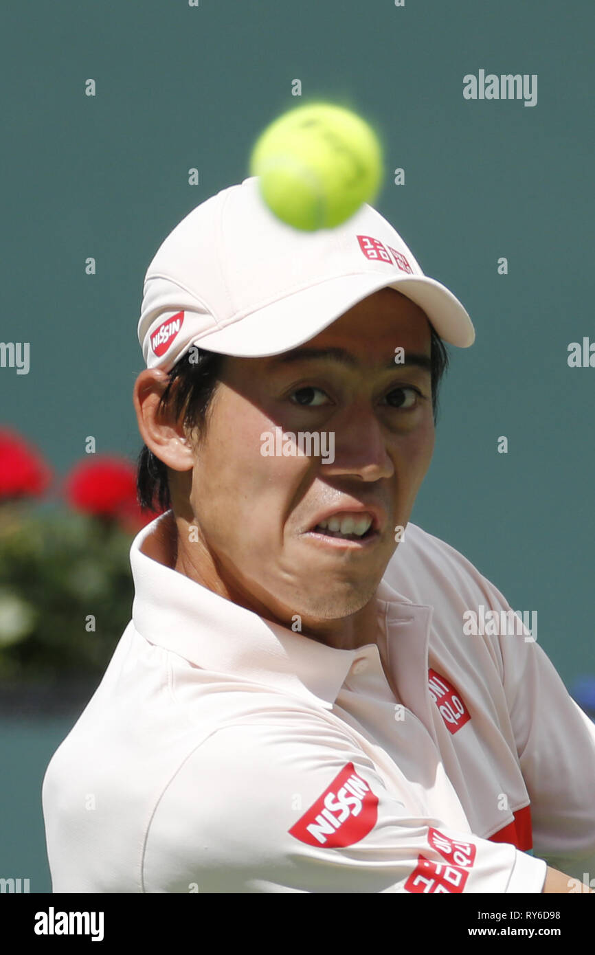 Indian Wells, en Californie, USA. Mar 12, 2019. Kei Nishikori du Japon, renvoie la balle à Hubert Hurkacz de Pologne pendant la match de simple hommes du BNP Paribas Open de tennis le dimanche, Mars 12, 2019 à Indian Wells, en Californie. Hurkacz a gagné 2-1. Ringo : crédit Chiu/ZUMA/Alamy Fil Live News Banque D'Images