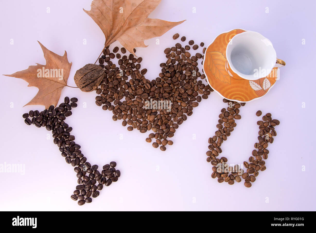 Les grains de café et tasse décoration Banque D'Images