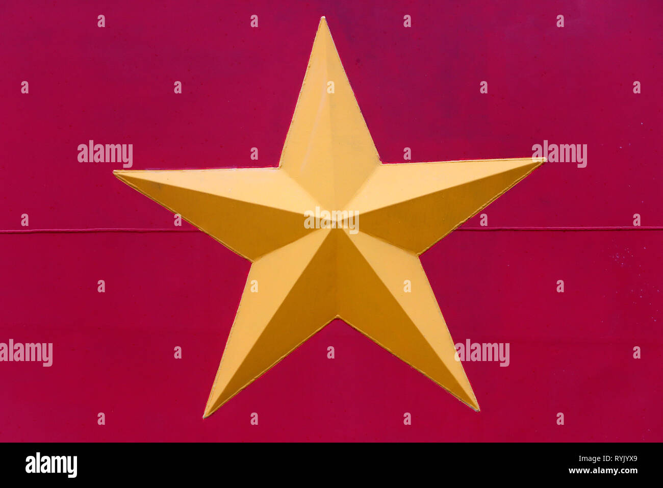 Étoile jaune. Drapeau communiste vietnamien. Le Vietnam. Banque D'Images