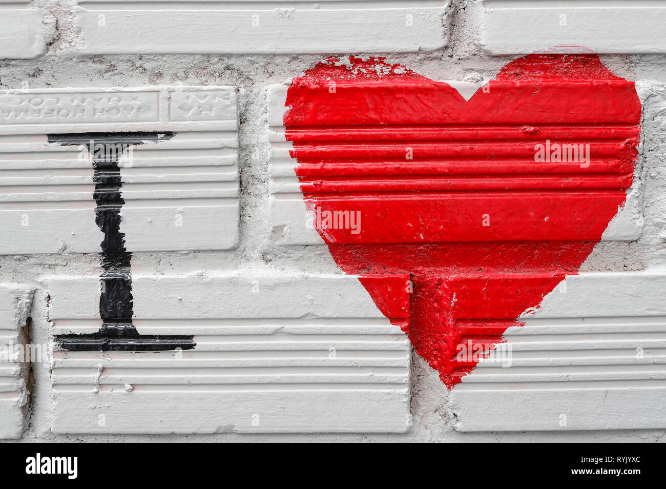 J'aime. Cœur rouge sur un mur. Notre annuaire d'entreprises. Le Vietnam. Banque D'Images