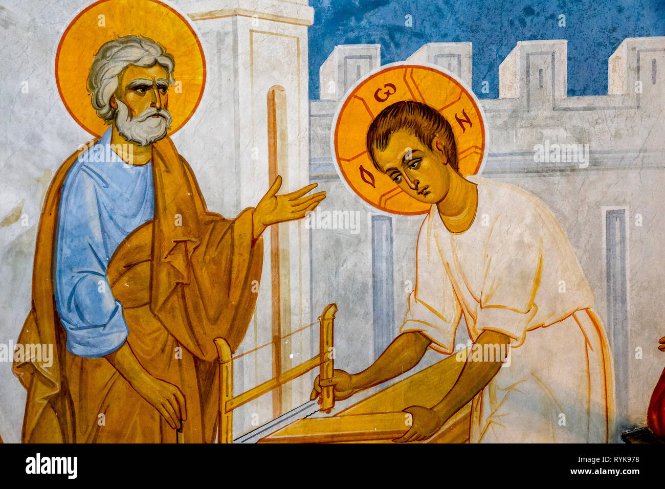 Détail d'une fresque dans l'église grecque orthodoxe de l'Annonciation, à Nazareth, Israël. Jésus à St Joseph's atelier de menuiserie. Banque D'Images